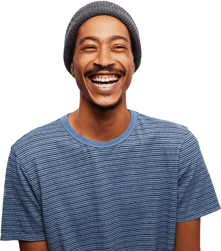 Smiling man wearing beanie and striped shirt portrait